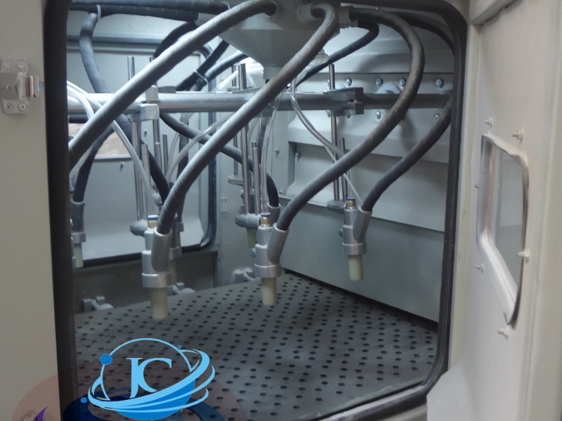 Máy phun cát tự động băng tải